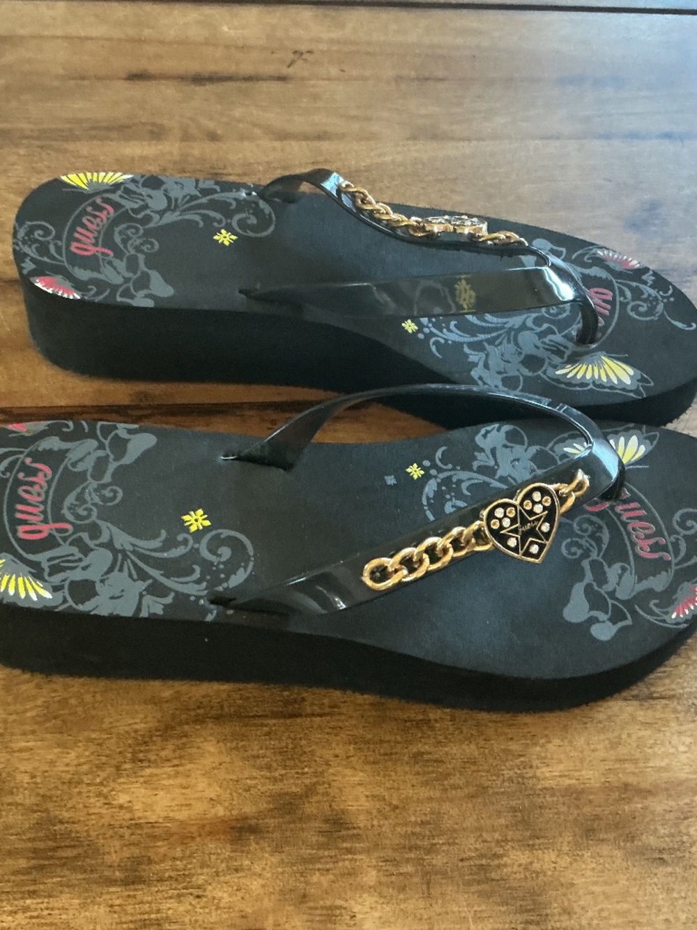 Guess wedge flip flops